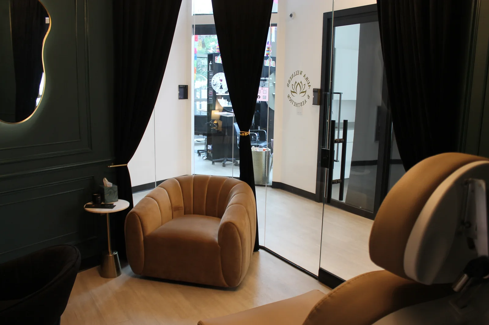 Velvet lounge seating inside the Aura suite